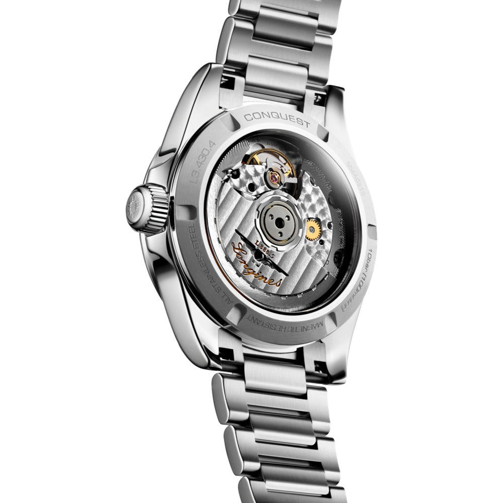 Longines Conquest 34mm – Sonnenschliff Blau am Armband